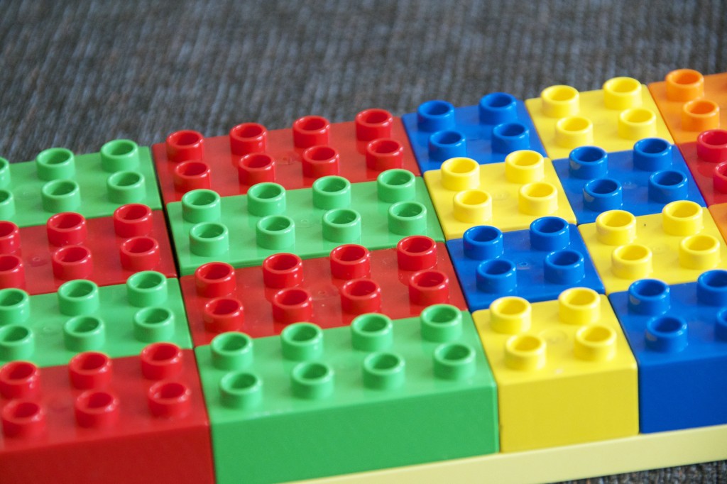 Pattern made with brightly coloured DUPLO bricks
