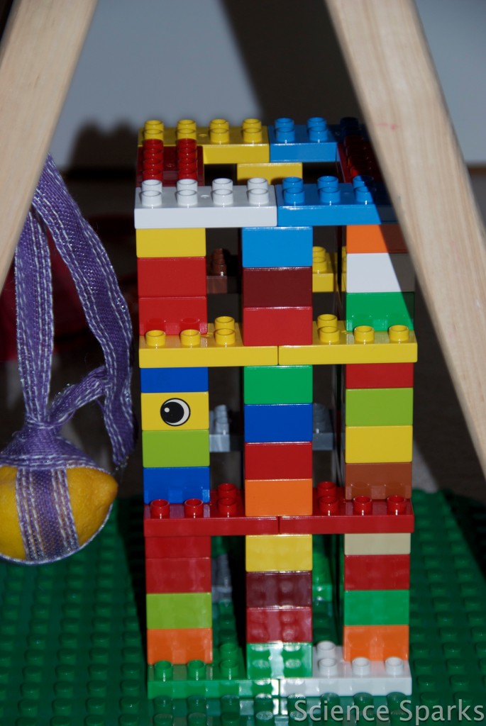 tower built from toy bricks for a science investigation