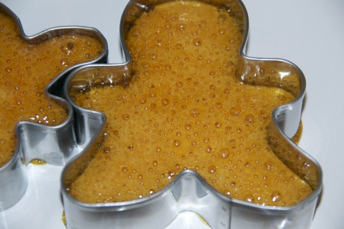 bubble orange honeycomb in a gingerbread man shaped cookie cutter