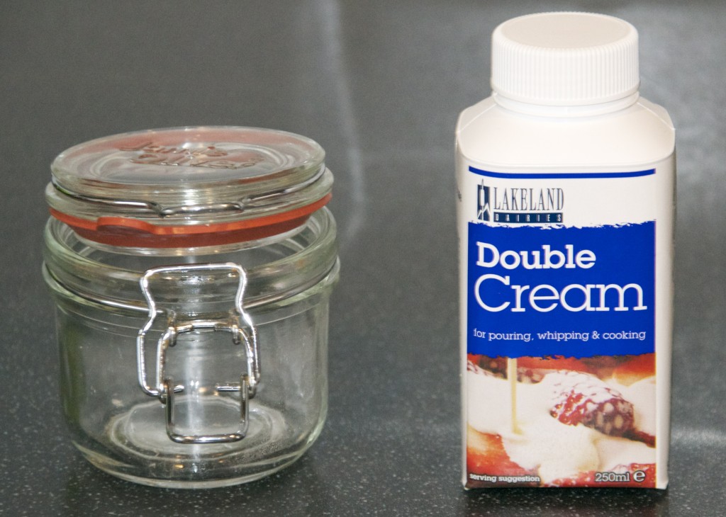 Glass jar and a carton of double cream for a making butter science activity
