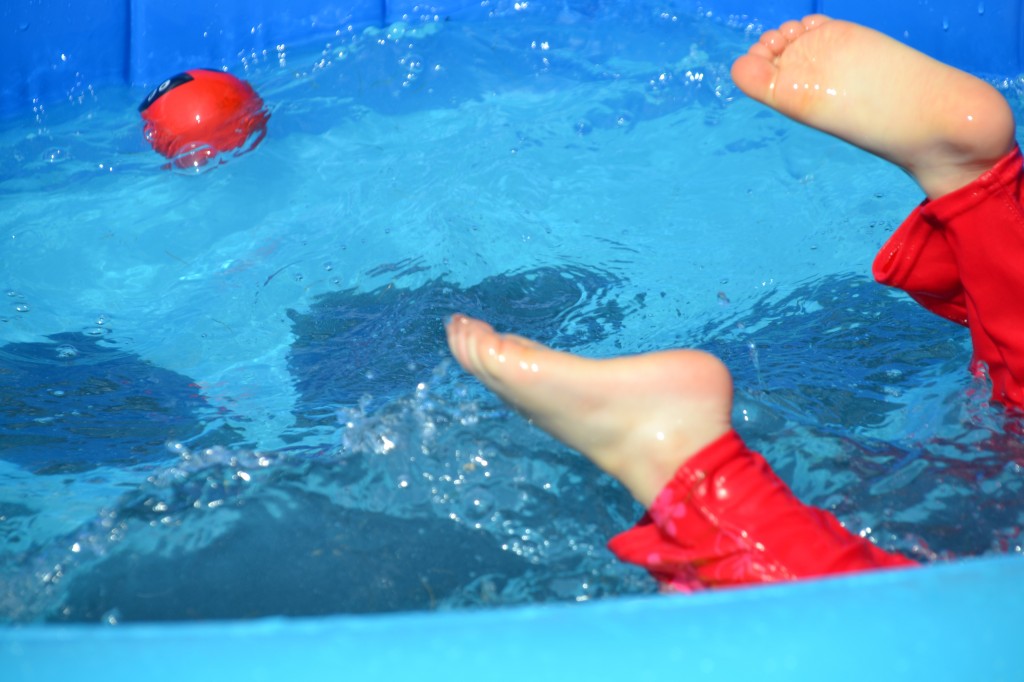 a ball floating in a paddling pool for a series of science studies in the paddling pool