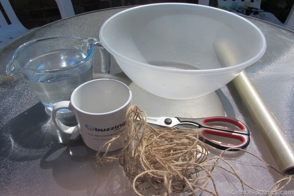 bowl, jug of water, mug and string for a water cycle activity