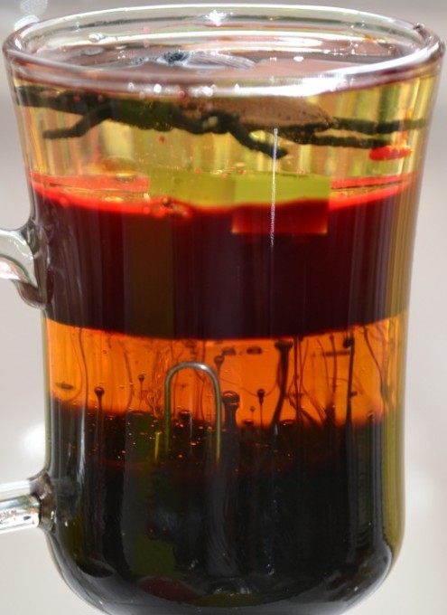 Halloween density jar made with treacle, golden syrup and other spooky liquids.