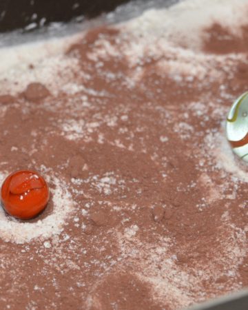 Crater experiment with marbles and flour