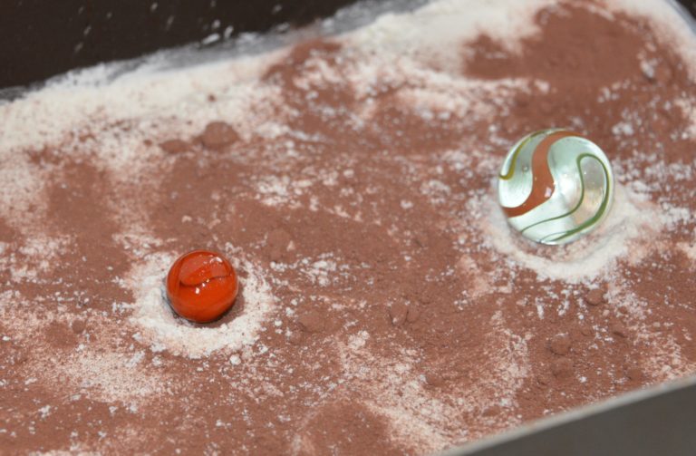 Crater experiment with marbles and flour