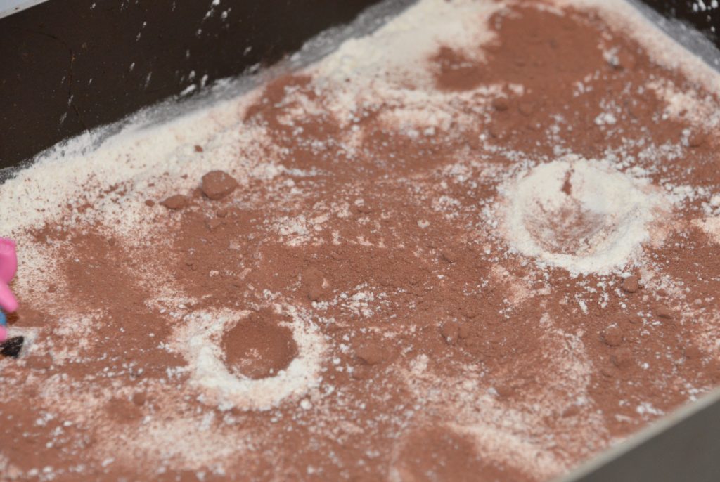 Crater experiment with marbles and flour - space experiments for kids