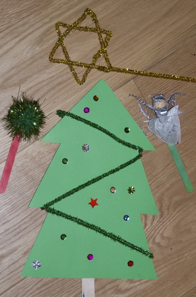 Large cardboard Christmas tree for a festive shadow puppet activity