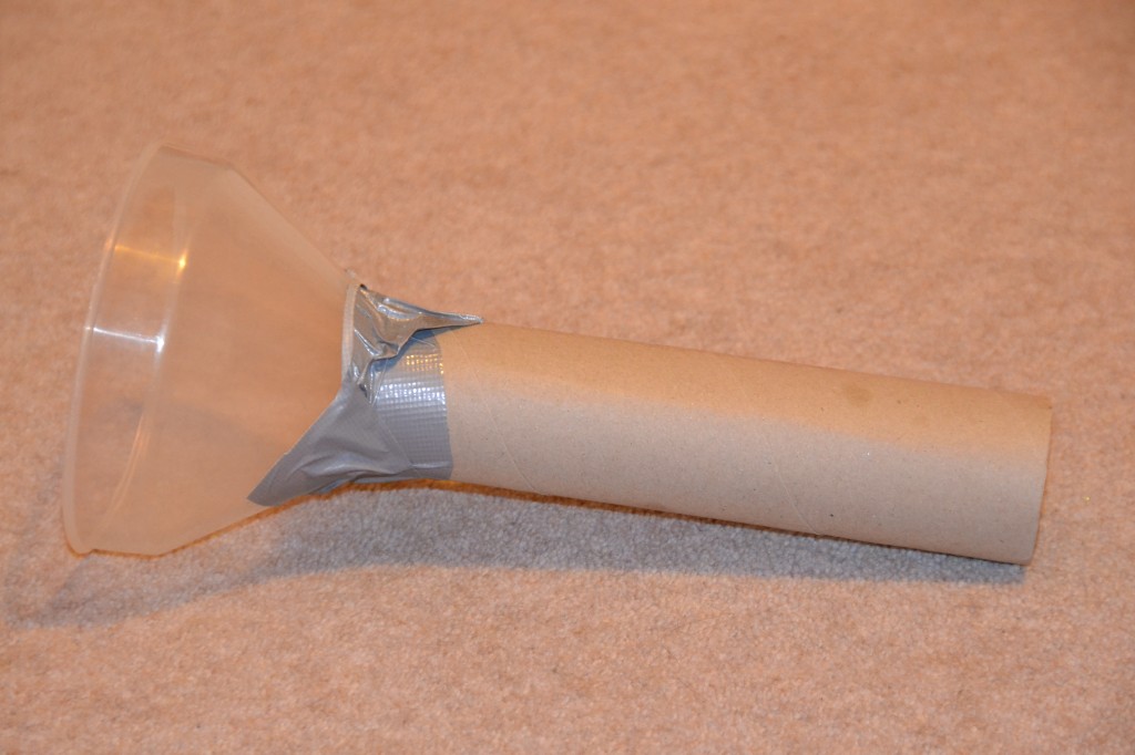 stethoscope made from a funnel, tape and cardboard tube