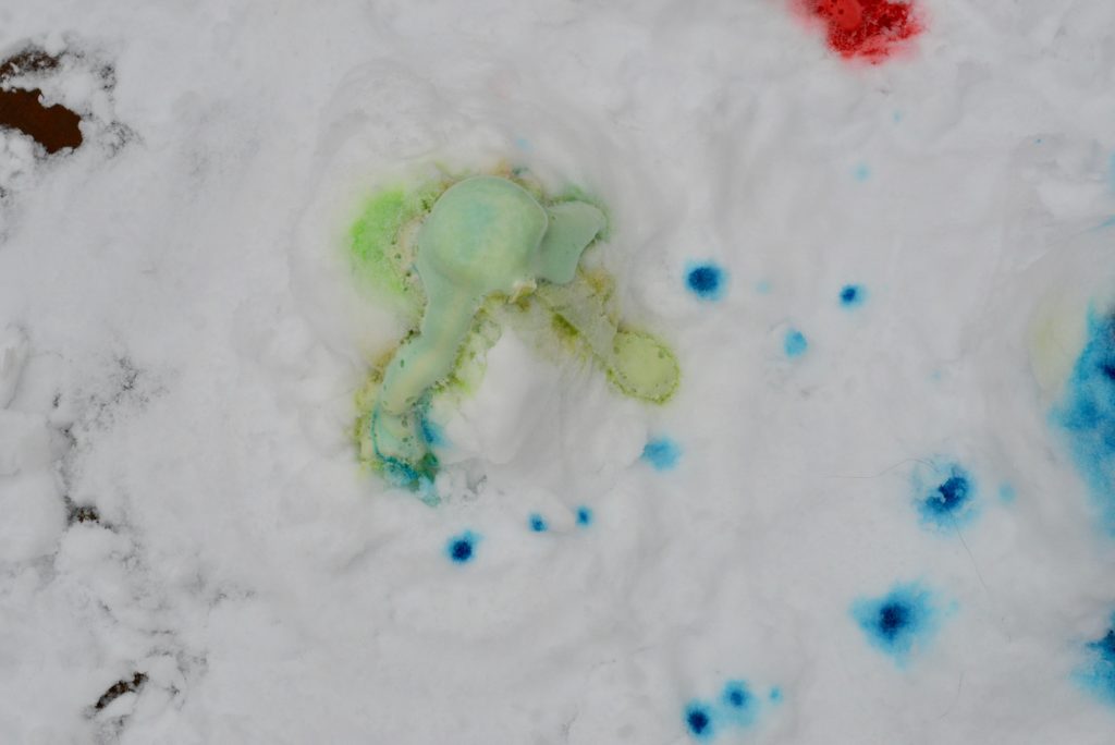 Lave made from snow using food colouring, baking soda and vinegar for the eruption.
