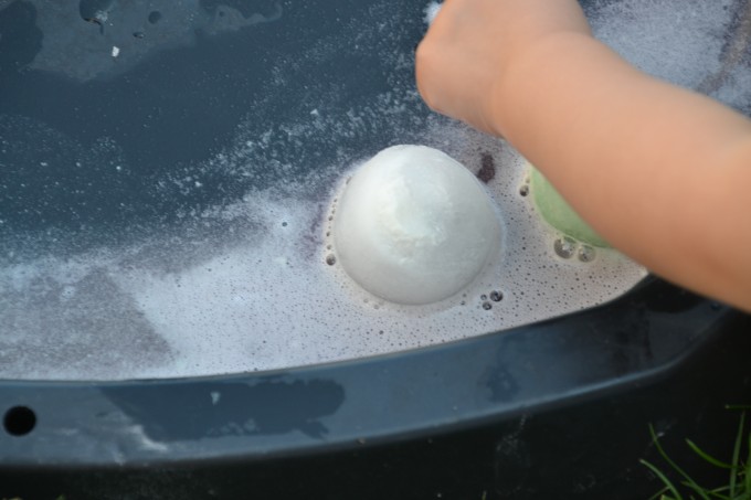 round coloured ice cubes containing baking soda
