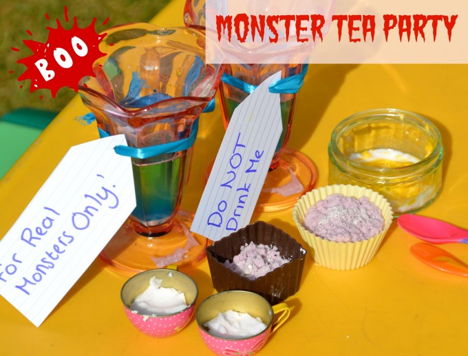 Baking soda and baking powder set up themed like a monsters tea party for a science experiment
