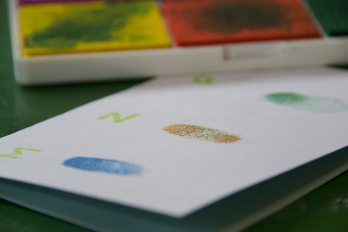 Fingerprints on a sheet of card for a fingerprint activity for kids