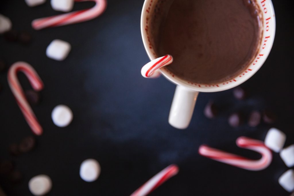 Candy cane in a hot chocolate drink