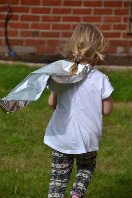 Superhero cape made from foil for a science experiment