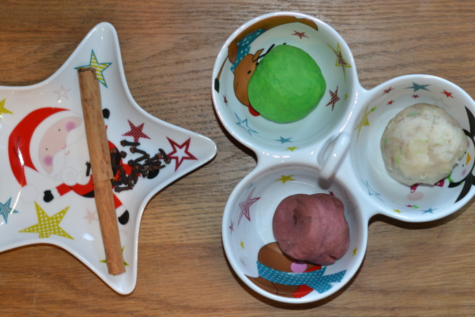 Christmas play dough in a bowl with spice next to it