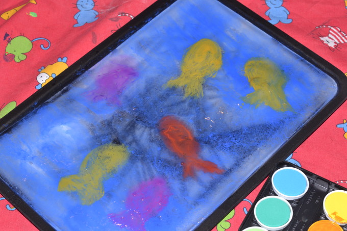 paint on a sheet of ice - fun preschool activity for kids.