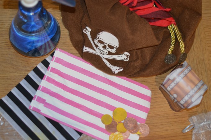 pirate bags and coins painted for a waterproofing STEM challenge