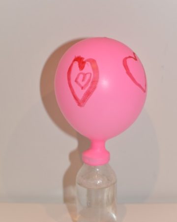 Blow up a balloon with alka seltzer