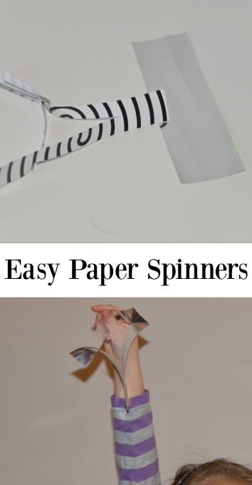 Child holding a paper spinner - easy science for kids