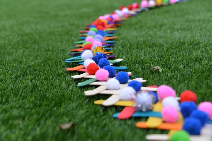 Popsicle Stick Chain Reaction set up and ready to fly - outdoor science for kids #scienceforkids #outdoorscienceforkids #chainreaction #popsiclestickcrafts