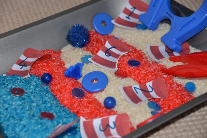 red, blue and white rice themed Cat in the Hat sensory tray