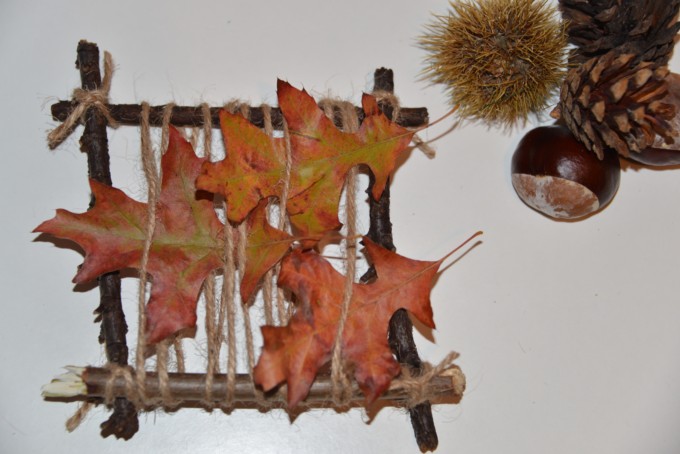 weaving loom made with sticks and leaves