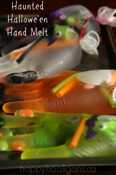 Frozen Halloween hands for a science experiment