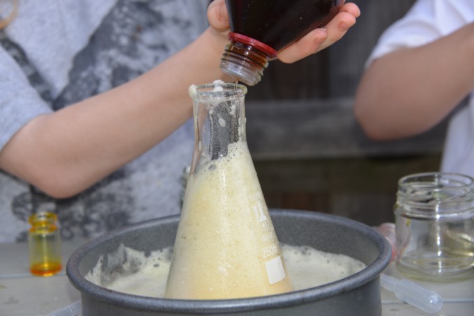 vinegar being poured into a magical fairy potion