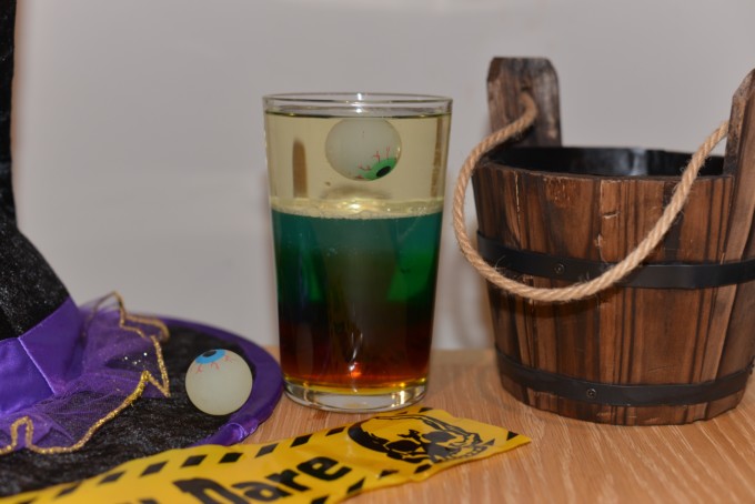 Wizard Potion made with different density liquids in a glass
