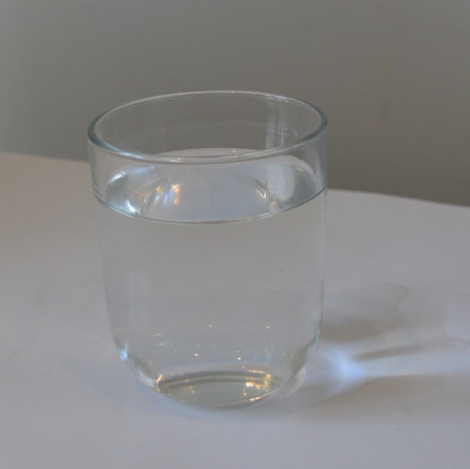 empty glass of water for a refraction of light experiment.