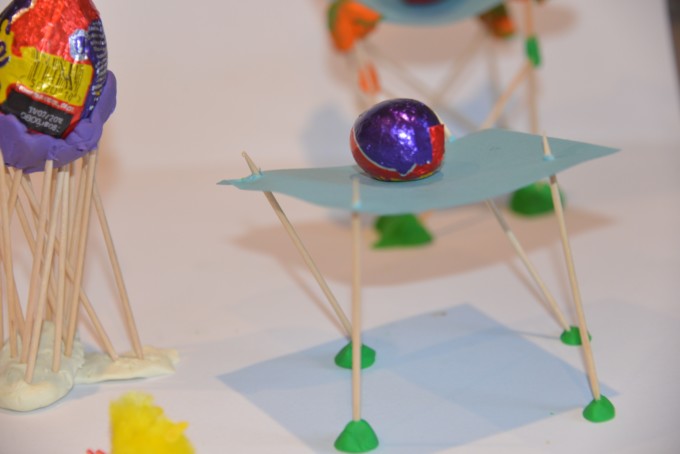 toothpick structures with chocolate eggs on top for a fun Easter STEM Challenge