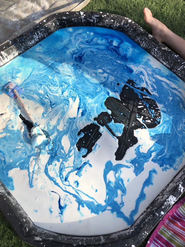 giant tray of blue and white oobleck