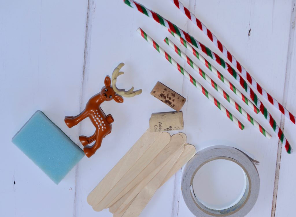 Christmas STEM - raft for reindeer -example materials - straws, lollysticks, tape, sponge, toy reindeer