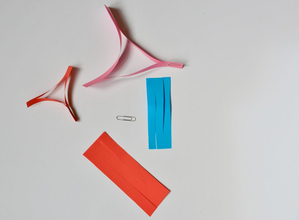 Paper spinners. Super easy to make flying spinners made with paper and a paperclip.