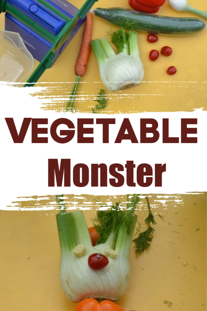 Spooky vegetable monster for Halloween made from fennel, pepper, tomato and baby corn