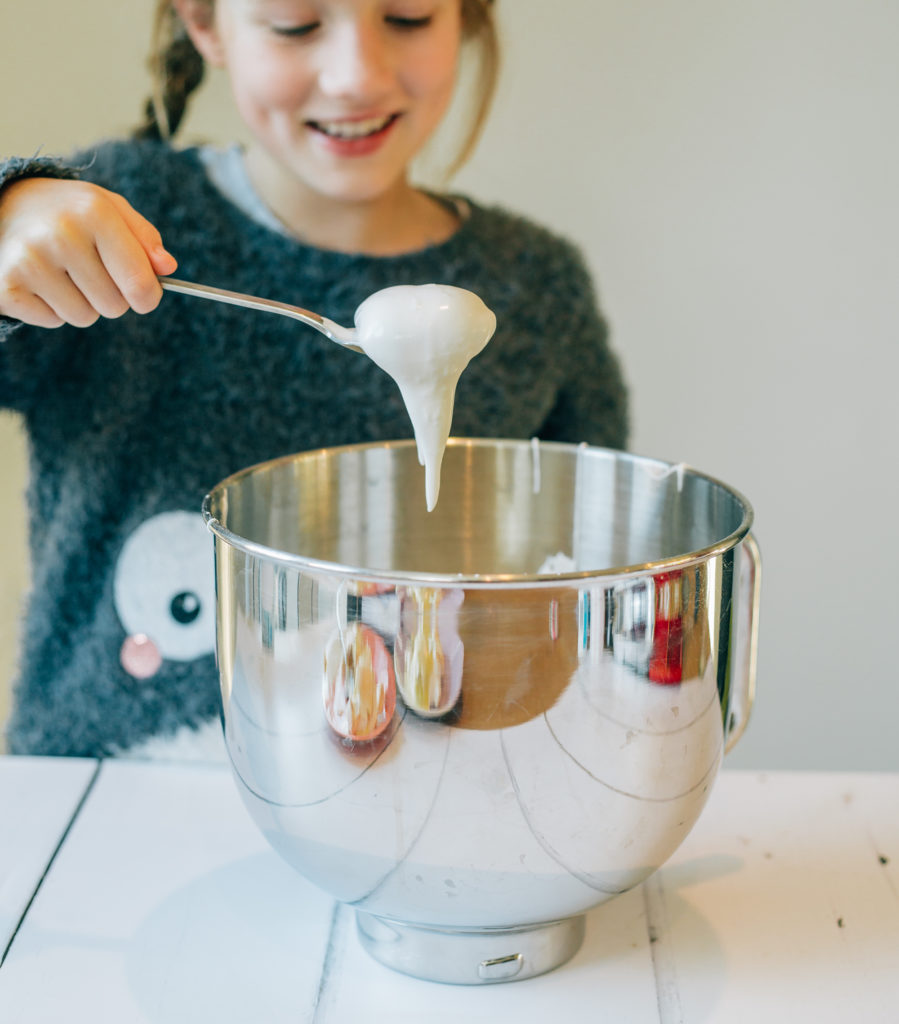 child making merginue to learn about kitchen science