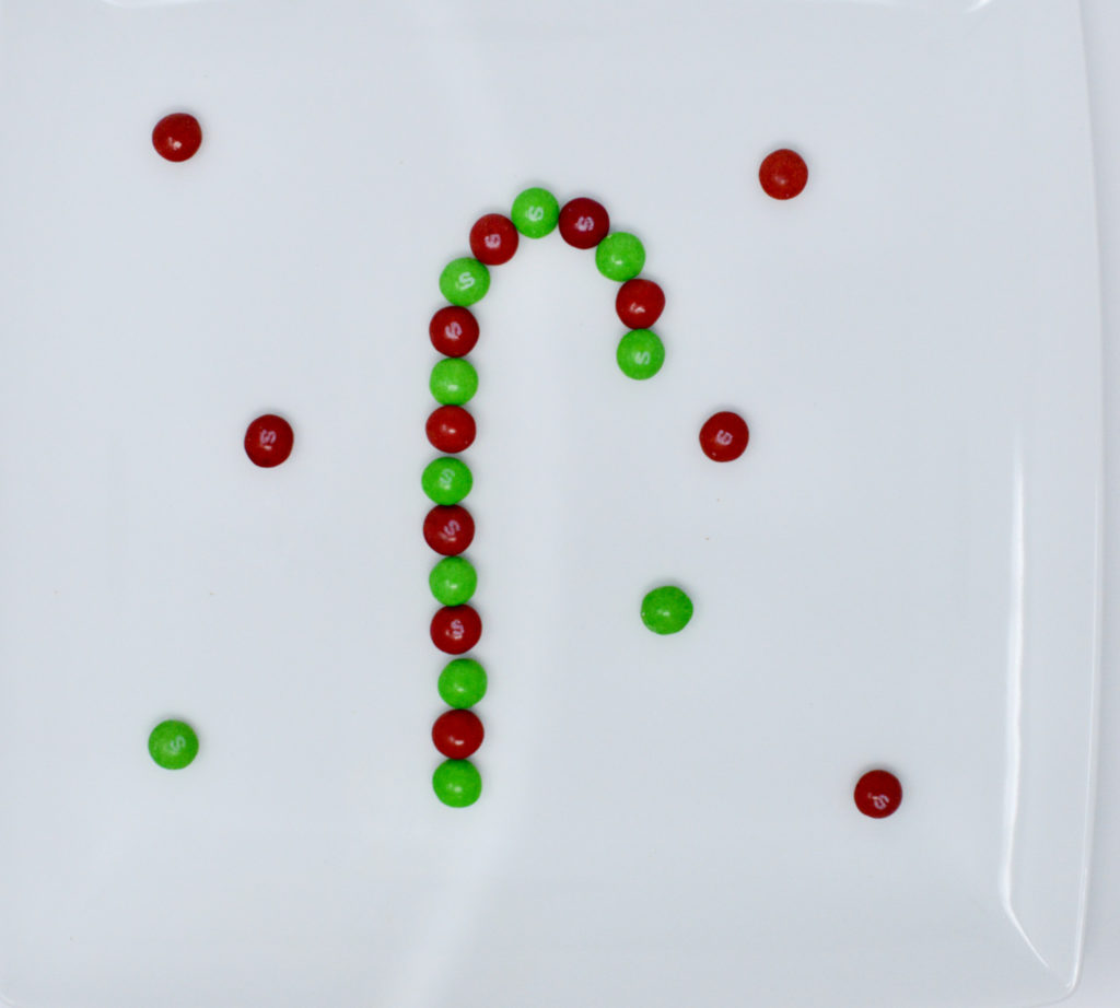 Christmas skittle candy experiment - skittles in the shape of a candy cane