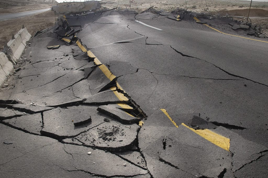 Earthquake Image - cracked road after an Earthquake