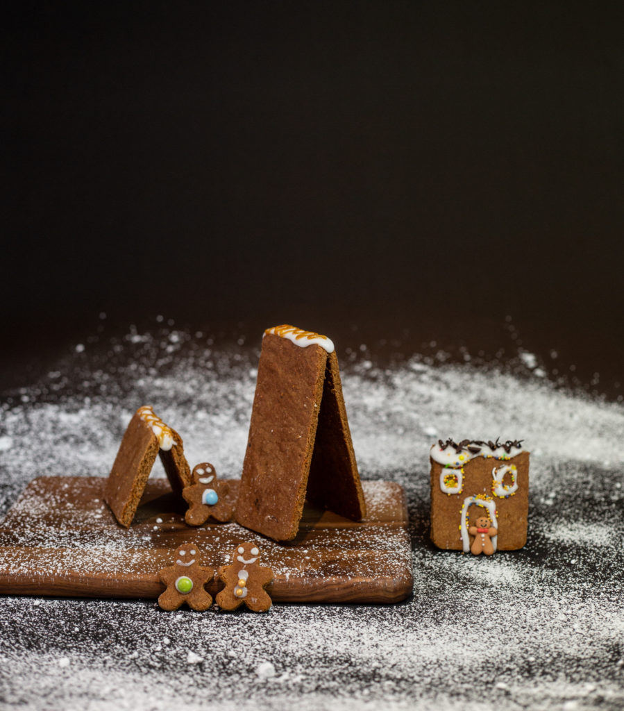 Gingerbread houses, made for a science experiment testing which materials are best to stick them together. #Scienceforkids #funscience #kitchenscience 