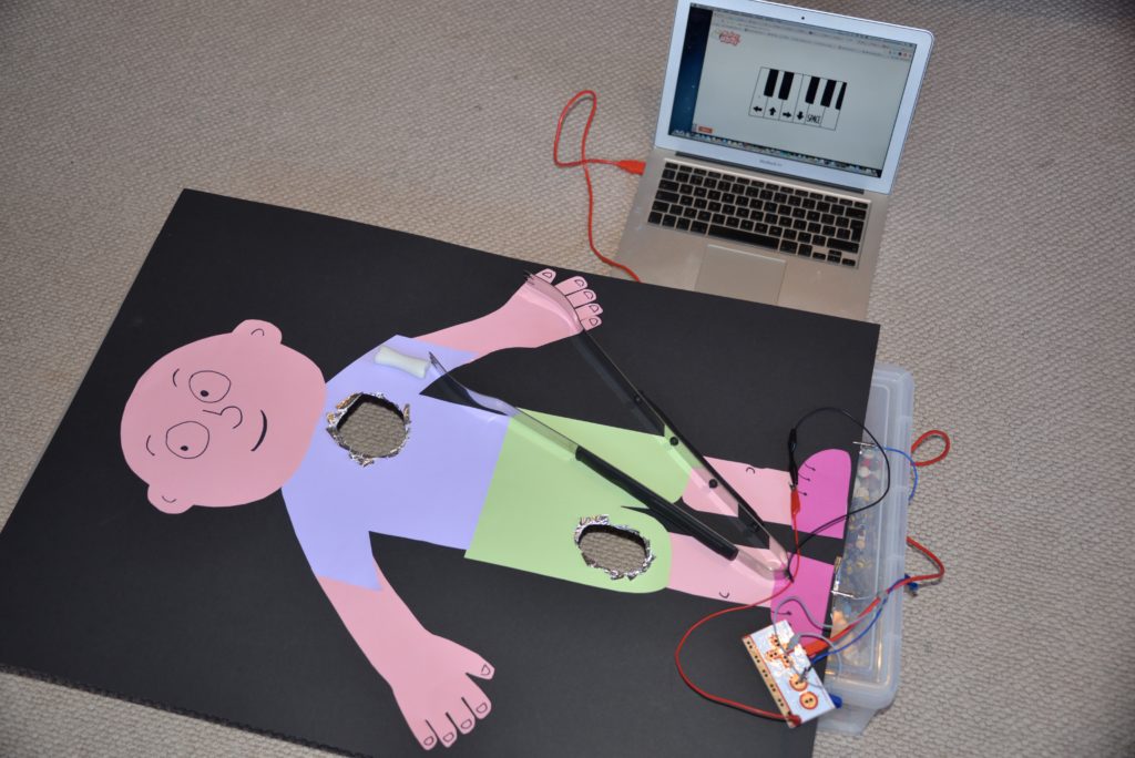 giant operation game made using a huge sheet of black card, aluminium foil and a Makey Makey