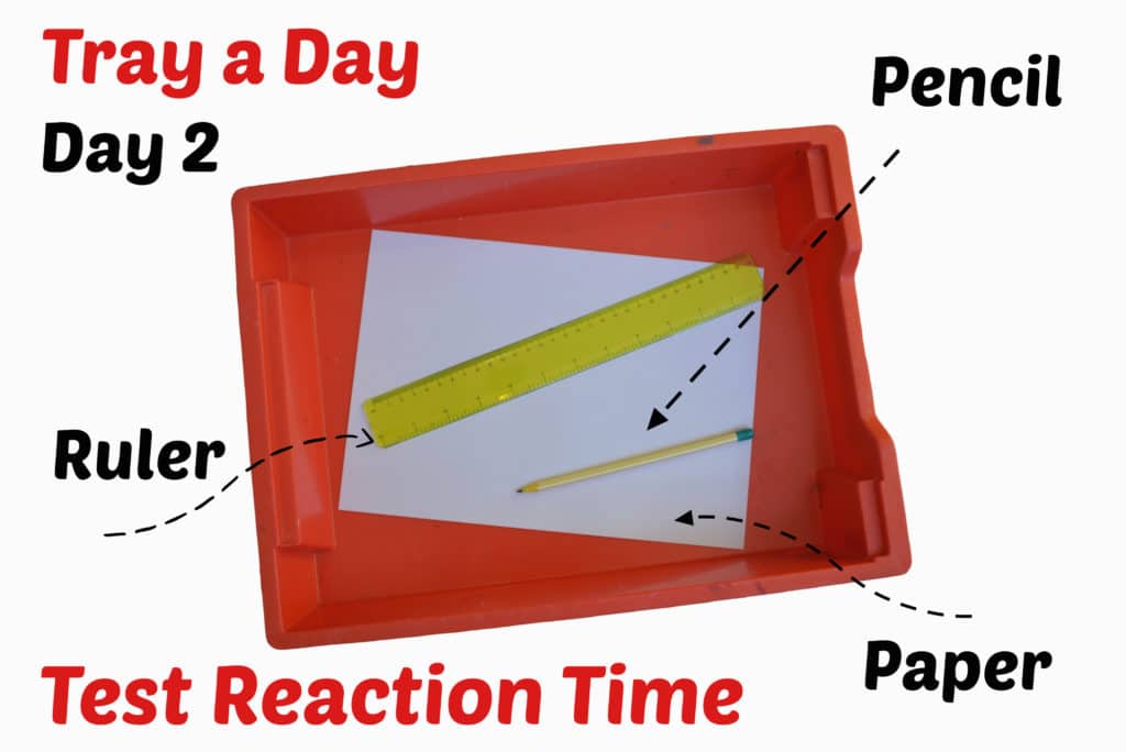 ruler, paper and pen for a reaction time test