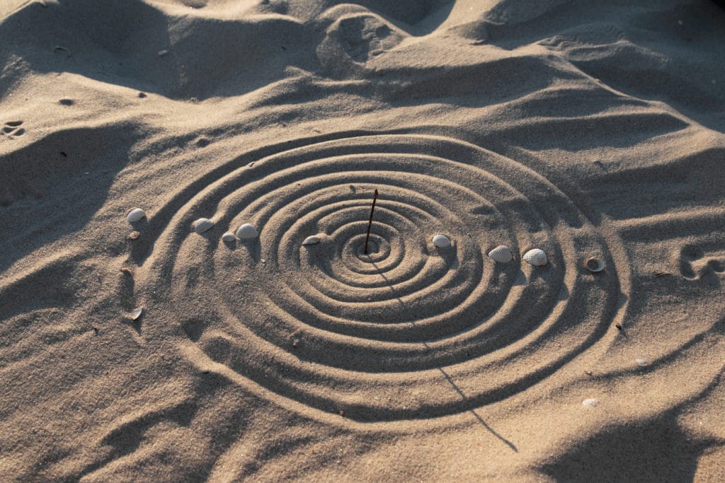 sundial on a beach