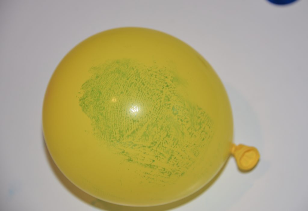 Balloon with a large fingerprint image - part of a fingerprint science project #scienceforkids