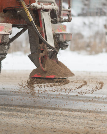 grit machine on a road