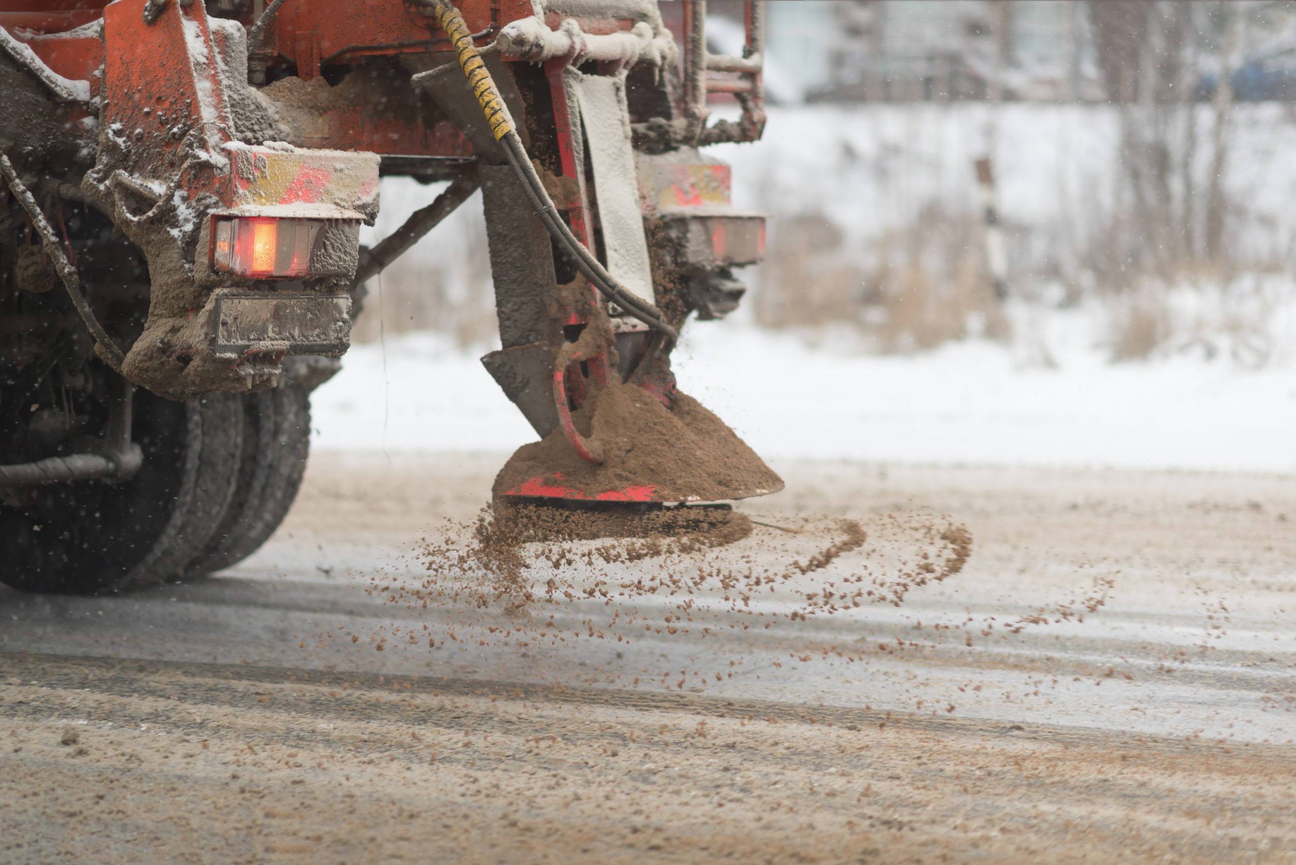 grit machine on a road