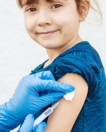 image of a child having a vaccine