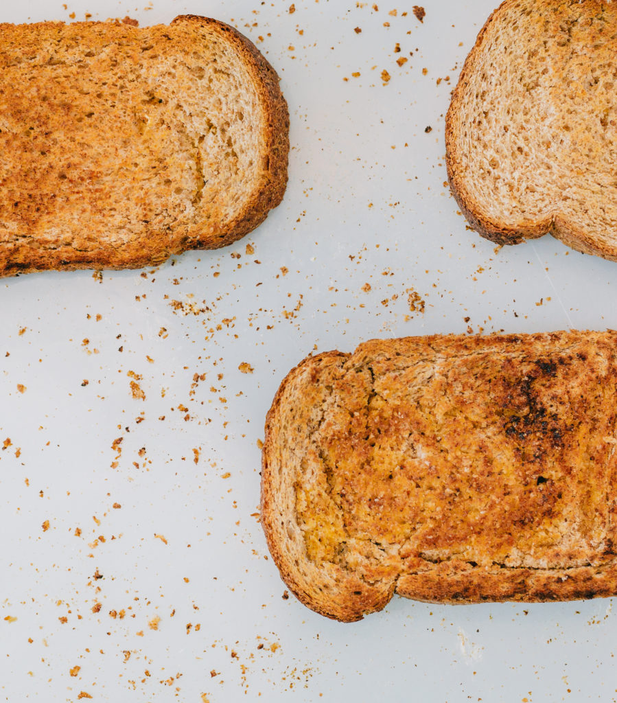 Buttered toast lying on the floor as part of a 'why does toast land butter side down' experiment