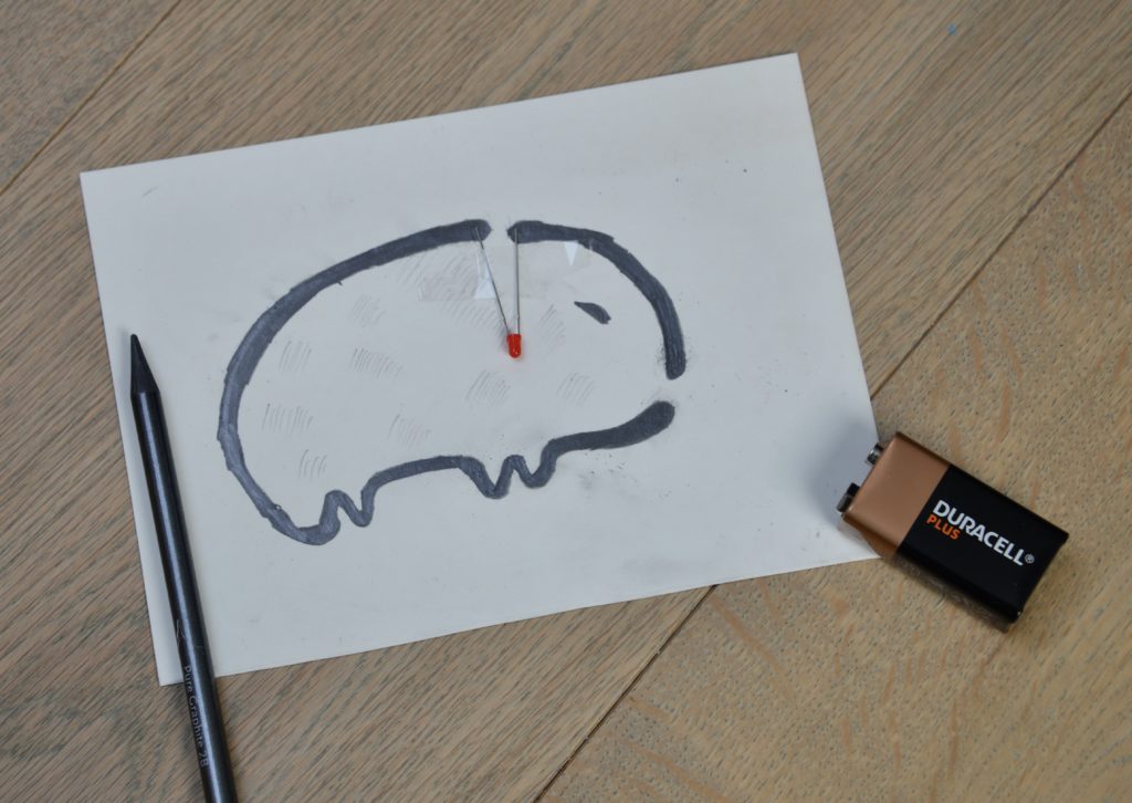 Pencil circuit drawing with an LED