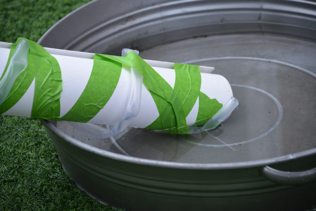 archimedes screw  for a STEM challenge. Made from a pipe and PVC tubing