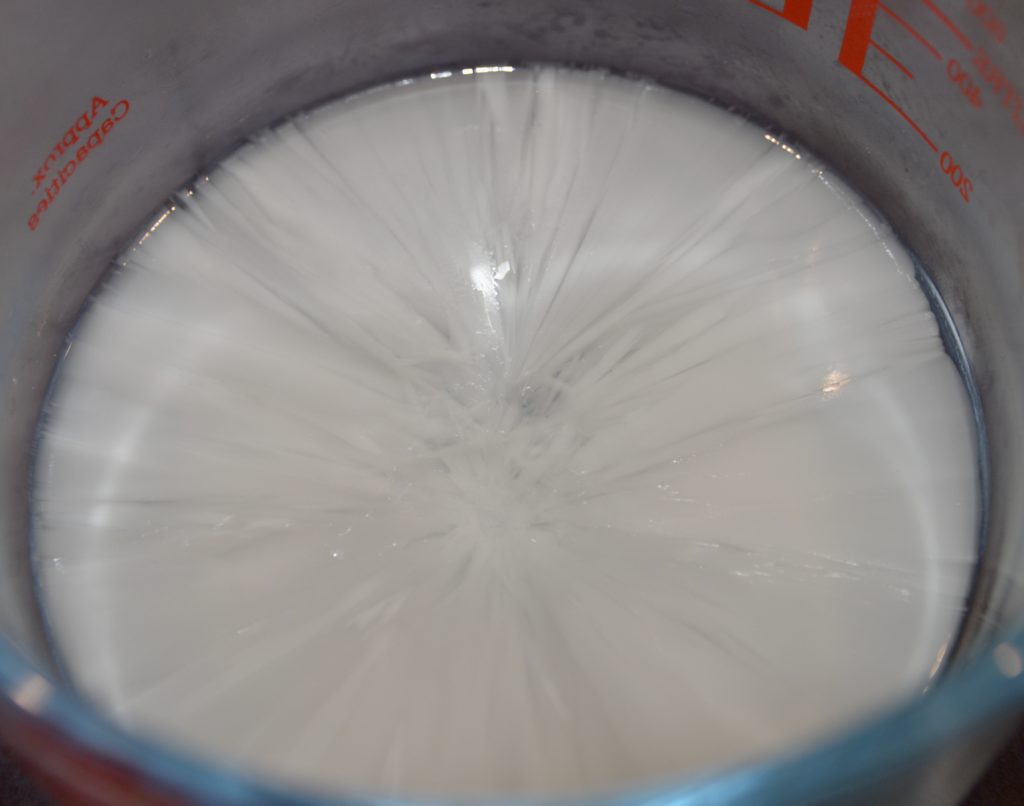 sodium acetate crystals in a jug